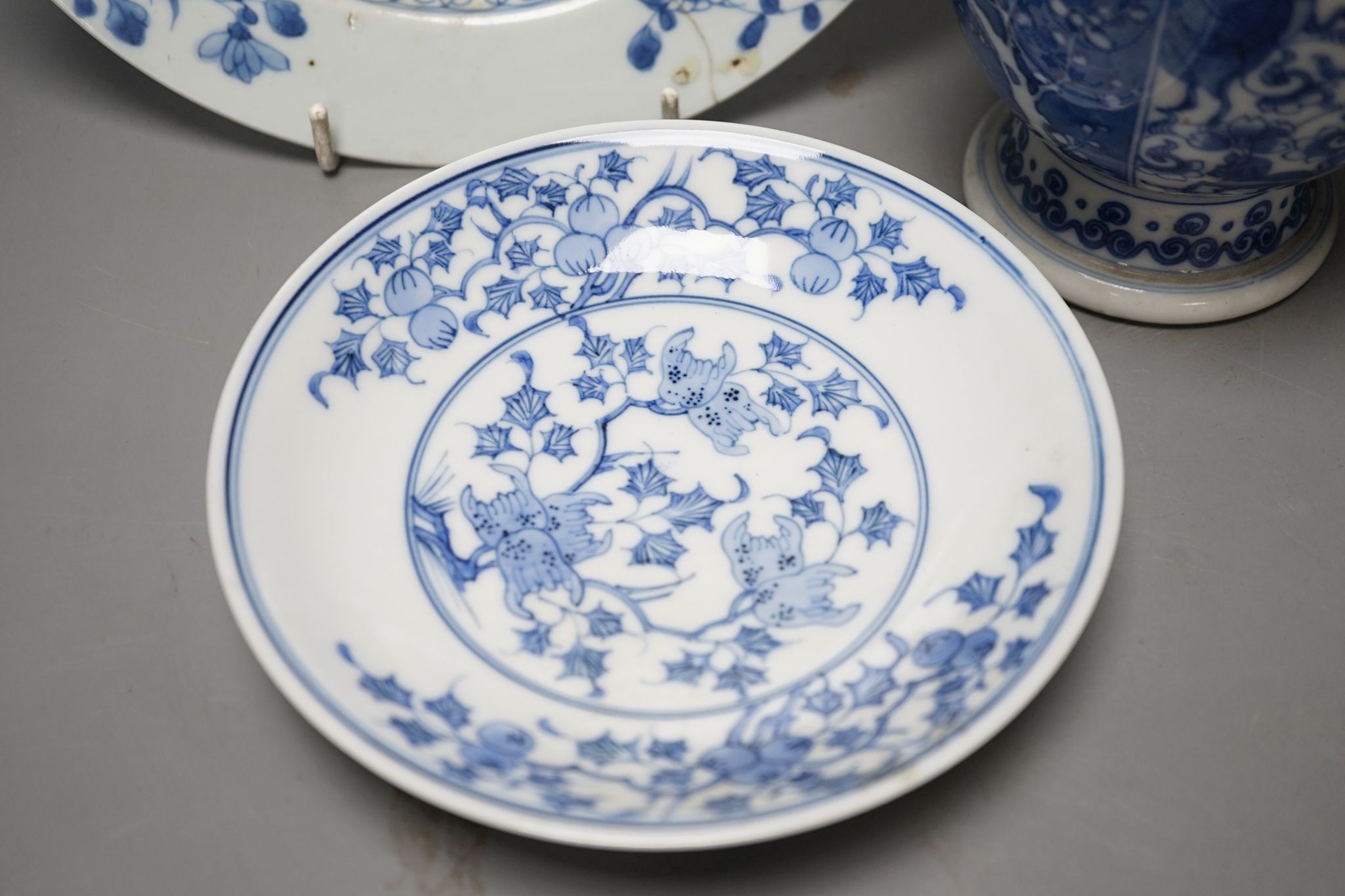 A Chinese blue and white ovoid vase, 20cm a similar dish and plates and celadon glazed vase